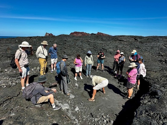 Roberto explaining the way magma circulates beneath the earth's crust.