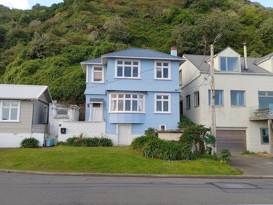 Lots of cute houses perched on and below hillsides.