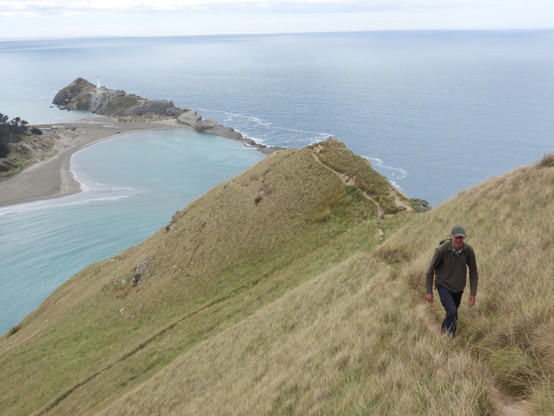 John walking up the steep track at Castle Point