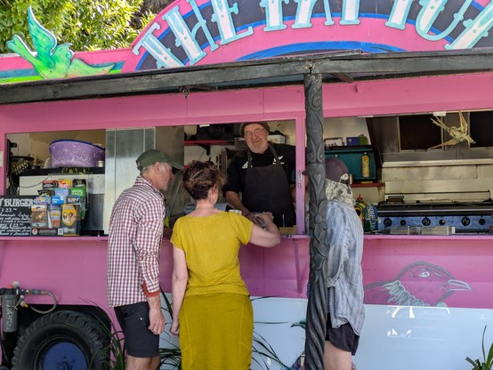 John, Ally and Lynda discussing the finer points of burger construction with the proprietor