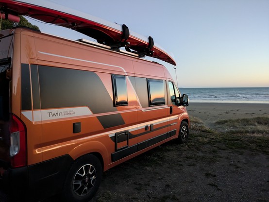 The van looking all sunsetty and kayakey at Marfell's Beach (where we didn't actually kayak).