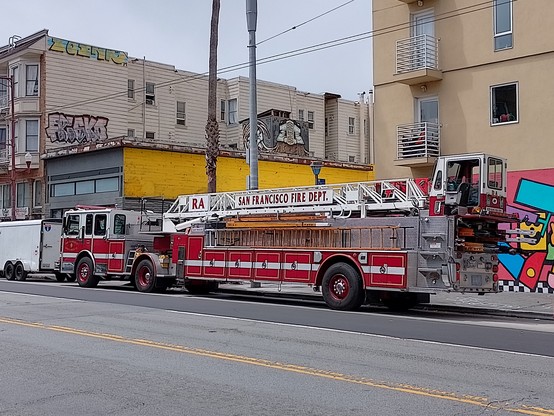 A classic San Francisco fire engine with long ladder.