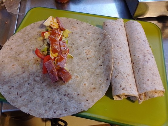 Our go-to for tramping lunches. Wraps with avocado, camembert, capsicum, salami and Kaitaia Fire. All ingredients that don't need refrigeration.