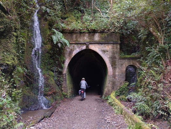 Sally entering one of the tunnels. The lights on the bikes came in useful.