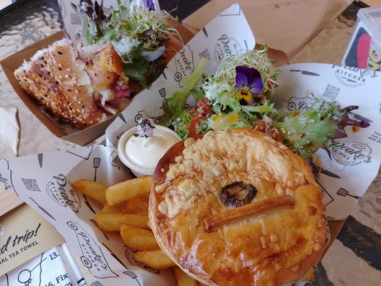 Steak, bean, jalapeno and cream cheese pie as well as a toasted chicken, bacon, camembert and cranberry sandwich.