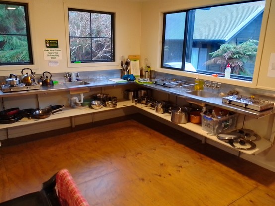The kitchen in the common area. Free gas, cutlery, crockery and cooking utensils
