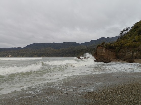 Wild and woolly south coast beach. I pulled my calf muscle seconds after this photo sprinting away from an incoming double wave.