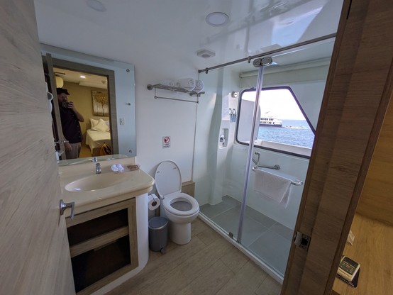The shower and toilet with a view beyond our balcony.